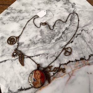 Handmade necklace with portrait and charms
